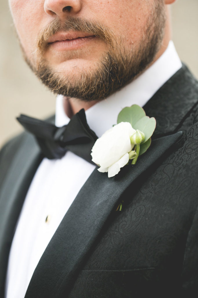 Cole had a custom designed tuxedo from Paolini | Floral by Blue Bouquet at The Grand Hall at Power & Light