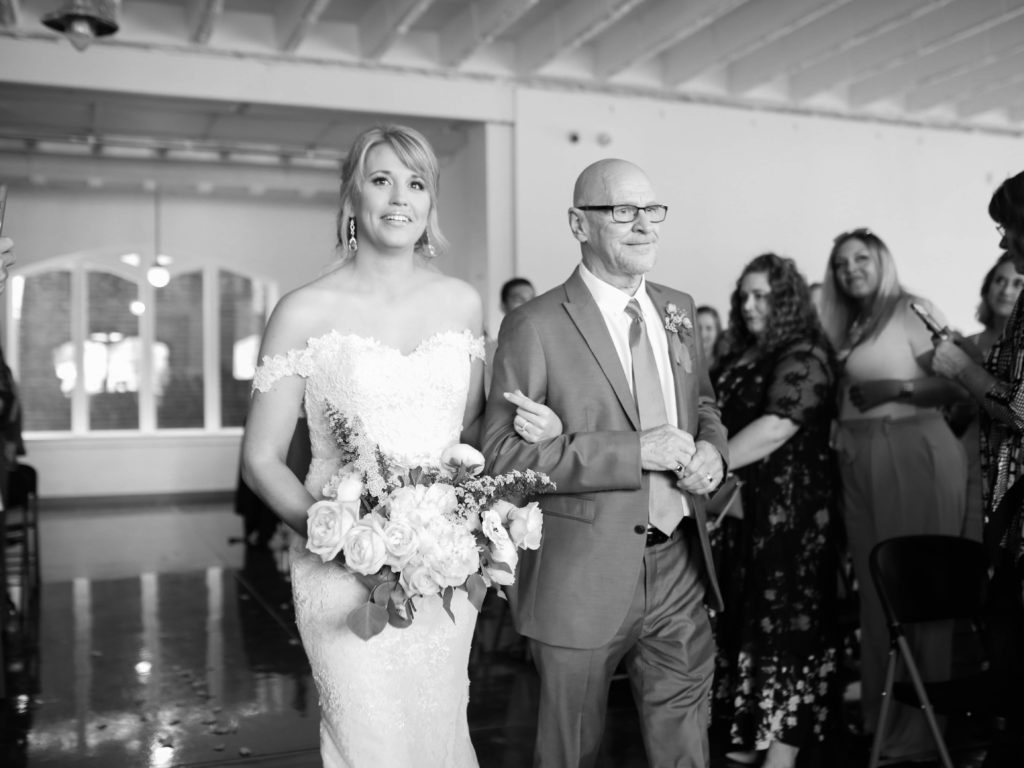 Father and Daughter Walking Down the Aisle