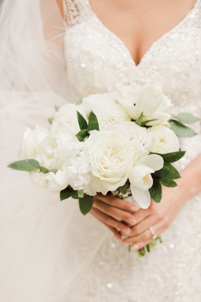 All-White Bridal Bouquet Captured by Laura Foote Photography | Floral by Blue Bouquet | Kansas City Florist, Midwest Florist | Wedding at The Intercontinental Hotel, Wedding at Loose Park Rose Garden