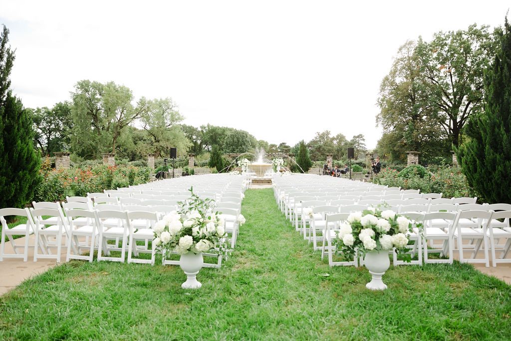 All-White Ceremony Set-Up at Loose Park Captured by Laura Foote Photography | Floral by Blue Bouquet | Kansas City Florist, Midwest Florist | Wedding at The Intercontinental Hotel, Wedding at Loose Park Rose Garden