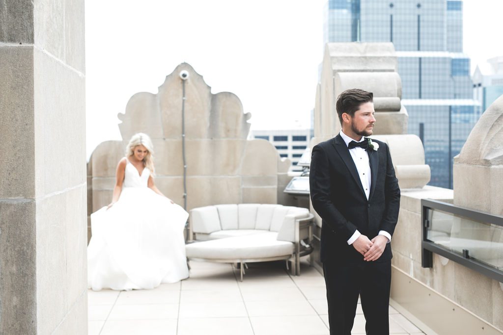 Bride + Groom First Look on the historic rooftop at The Grand Hall at Power & Light | Floral by Blue Bouquet at The Grand Hall at Power & Light